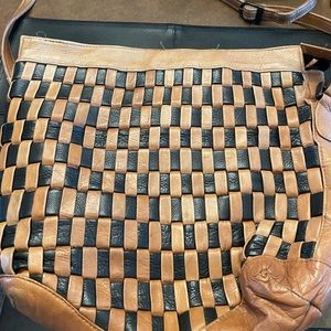 Leather purse made in Columbia. No brand, bought at a high-end local boutique.